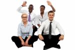 Business Team Sitting On Floor Stock Photo