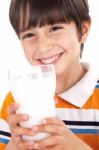 Happy Kid Drinking Glass Of Milk Stock Photo