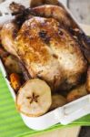 Roasted Chicken With Apples And Potatoes Stock Photo