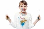 Cheerful Kid With Paint And Brush Stock Photo