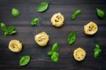 Ingredients For Homemade Pasta On Dark Wooden Background Stock Photo