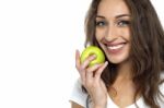 Health Conscious Woman About To Eat Fresh Green Apple Stock Photo