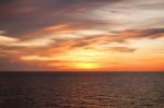 Sunset At Sea With Beautiful Clouds In The Evening And Twilight Stock Photo