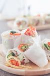 Fresh Spring Rolls On Wooden Table Stock Photo