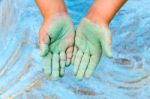 Child Showing Green Hands With Chalk Stock Photo