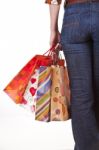 Woman Holding Shopping Bags Stock Photo