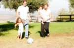 Parents Playing With Kids Stock Photo