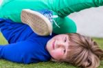 Bent Girl Lying On Her Back Stock Photo