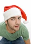 Young Male Wearing Christmas Hat Stock Photo