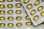 Yellow Oil Pills Stock Photo