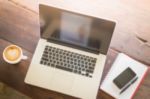 Hot Coffee Latte Cup On Working Table Stock Photo