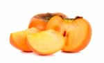 Persimmon On White Background Stock Photo