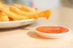 French Fried Dipped Sauce On Light Table Stock Photo