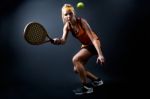 Beautiful Woman Playing Padel Indoor. Isolated On Black Stock Photo