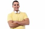 Fashion Guy With Headphones Around His Neck Stock Photo