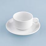 White Cup On Blue Background Solid Stock Photo