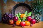 Fruits Placed On A Wooden Table Stock Photo