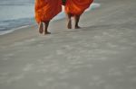 Monks On The Beach Stock Photo