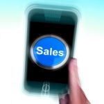 Sales On Mobile Phone Shows Promotions And Deals Stock Photo