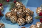 Pile Of Sweet Round Chocolate Candies Stock Photo