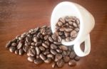 Roast Coffee Bean In White Mug Stock Photo