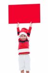 Christmas Boy With Empty Banner Stock Photo