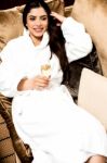 Beautiful Young Woman Relaxing In Bathrobe Stock Photo