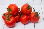 Tasty Pile Of Wet Tomatoes Stock Photo