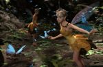 3d Rendering Of A Fairies Flying In Magical Forest Stock Photo