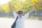 Young Beautiful Woman Wearing White Shirts ,straw Hat And Sun Gl Stock Photo