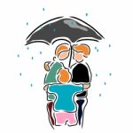 Family Hugging Under Umbrella Stock Photo