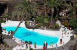 People Walking Round The Swimming Pool At Jameos Del Agua In Lan Stock Photo