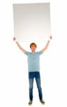 Teenage Boy Showing Blank Board Stock Photo