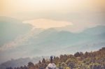 Instagram Filter Young Man Asia Tourist At Mountain Is Watching Over The Misty And Foggy Morning Sunrise, Travel Trekking Stock Photo