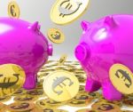 Raining Coins On Piggybanks Showing Profits Stock Photo