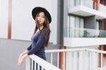 Beautiful Asian Young Woman Smiling On The City Stock Photo