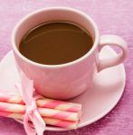 Mug Of Freshly Brewed Coffee And Some Strawberry Cookie Sticks Stock Photo