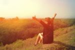 Women Relaxing Dna Happy On Hill Stock Photo