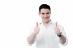 Successful Man Showing Thumbs Up Gesture Stock Photo