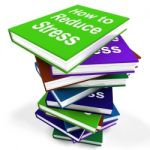 How To Reduce Stress Book Stack Shows Lower Tension Stock Photo