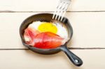 Egg Sunny Side Up With Italian Speck Ham Stock Photo