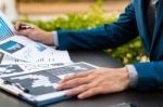 Handsome Businessman Wearing Suit And Using Modern Laptop Outdoo Stock Photo