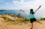 Woman Looking Ocean Views And Expressions Of Joy Stock Photo