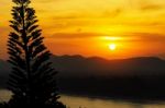 Sunset Over Mountain Range Stock Photo