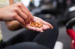 Happy Woman Having A Break From Exercising In Health Club Stock Photo