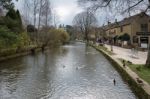 Tourists Wandering Around Bourton-on-the-water Stock Photo