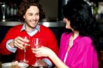 Cheers! Couple Celebrating Their Love Together Stock Photo