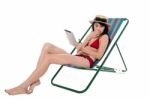 Amazed Bikini Lady Holding Tablet Stock Photo