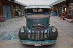 Old Vintage Green Chevrolet Truck At Night Market, Srinakarin Ro Stock Photo