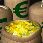 Bags Of Coins Showing European Earnings Stock Photo